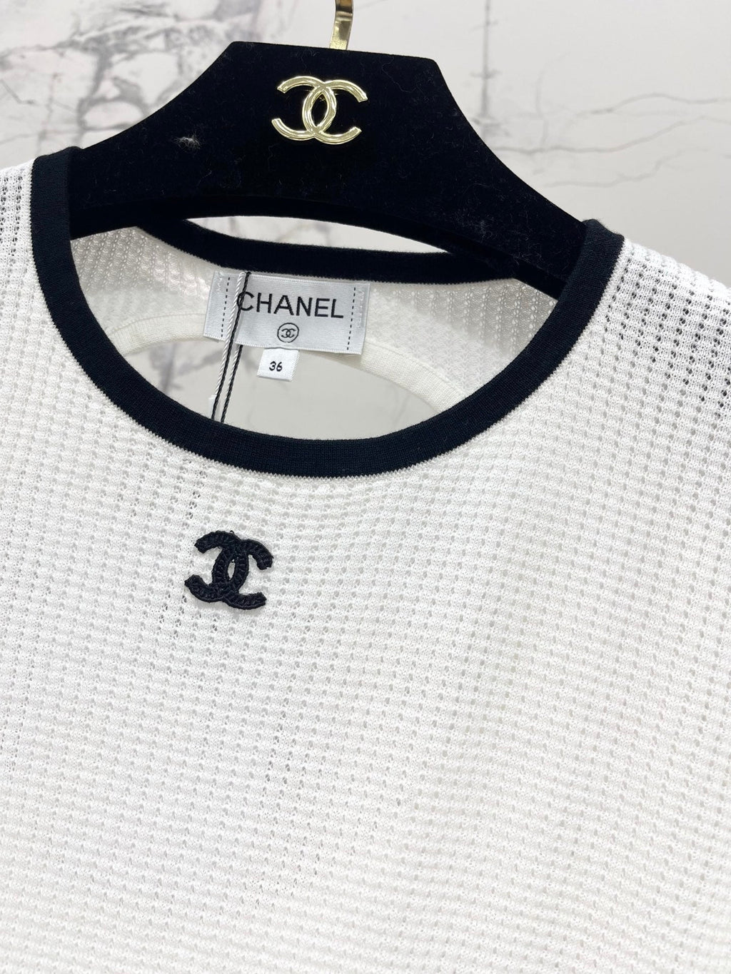 Color-blocked, openwork crew neck short-sleeved top