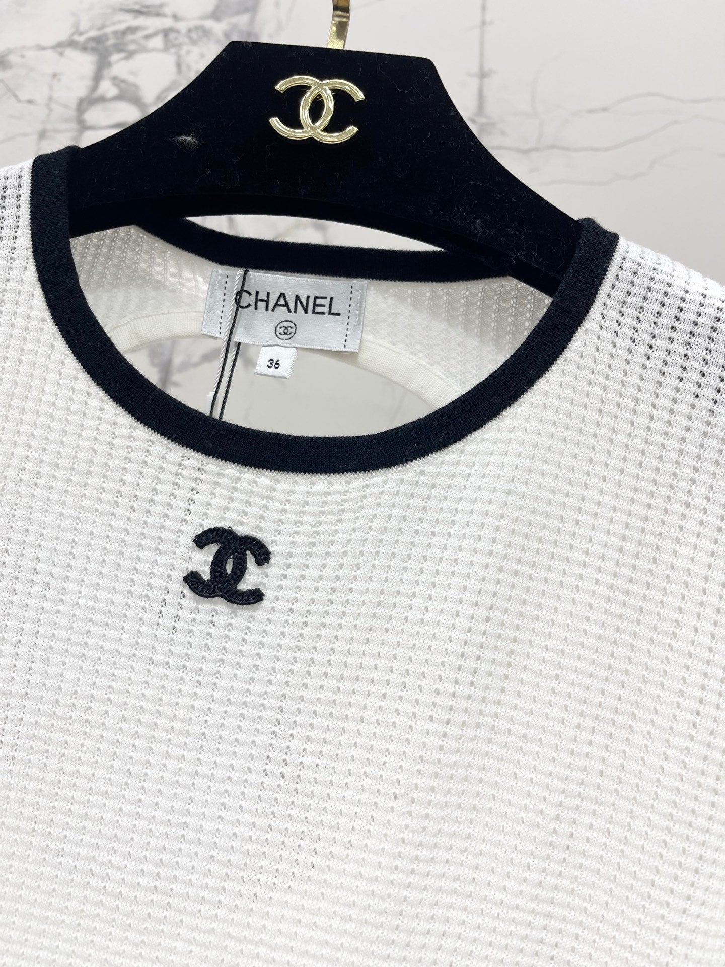 Color-blocked, openwork crew neck short-sleeved top