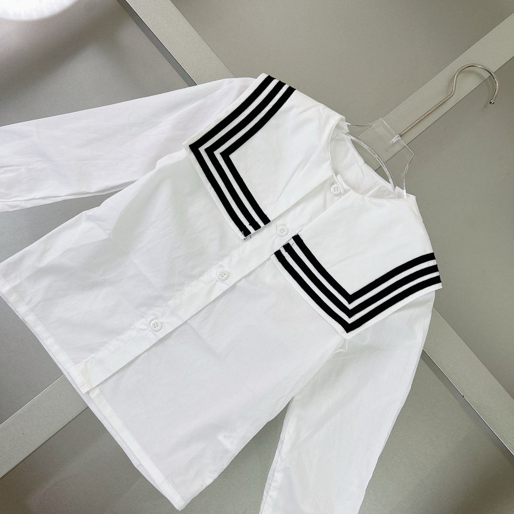 Navy-style shirt + pleated skirt