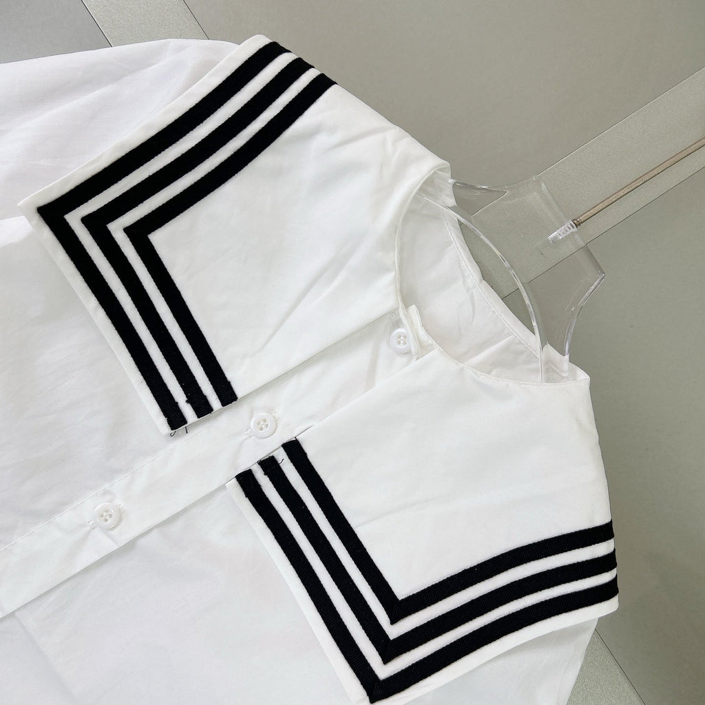 Navy-style shirt + pleated skirt