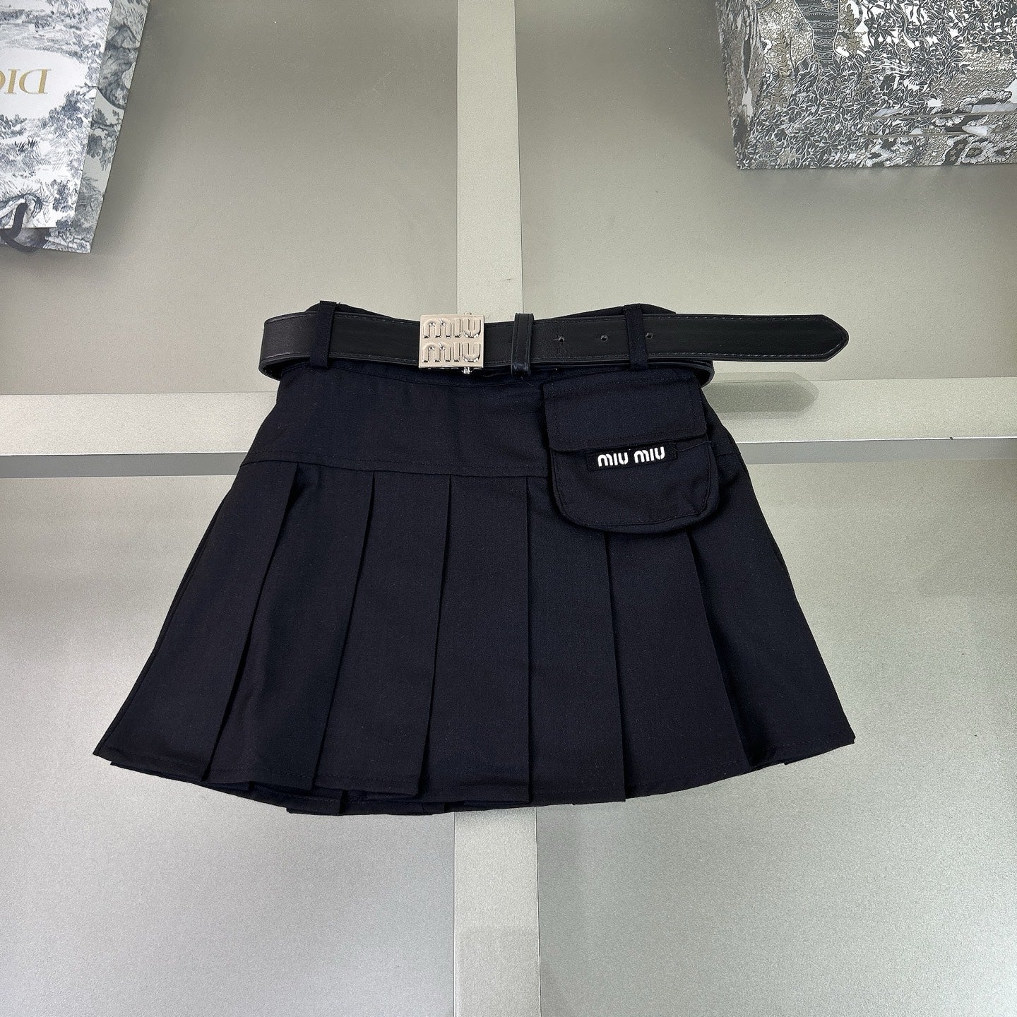 Navy-style shirt + pleated skirt