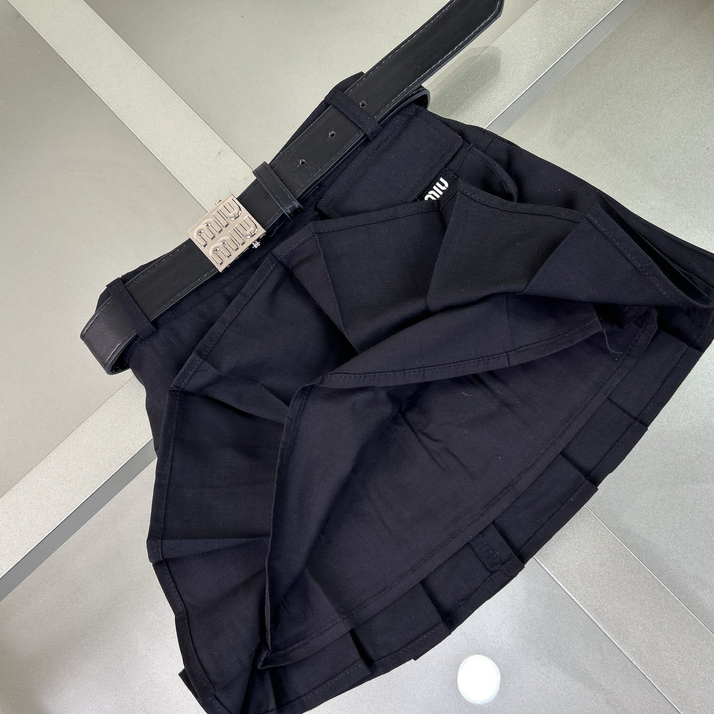 Navy-style shirt + pleated skirt