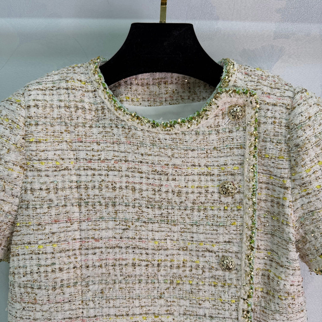 A light beige tweed blend short-sleeved jacket