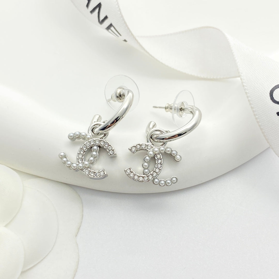 Pearl and rhinestone hook earrings