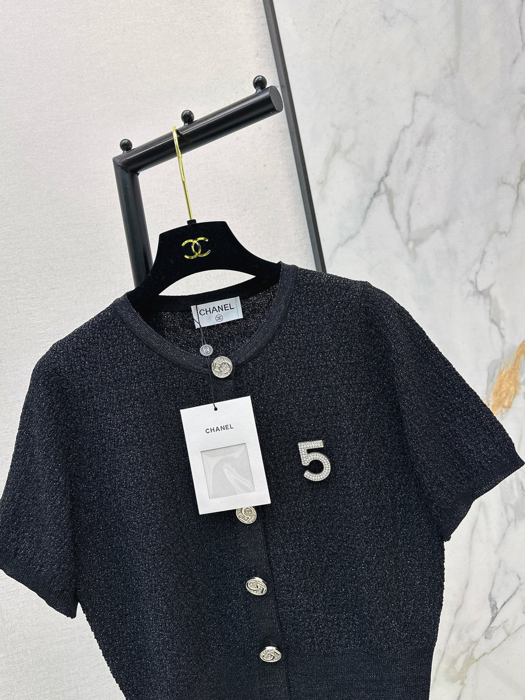 Hardware-embellished short-sleeved knit top