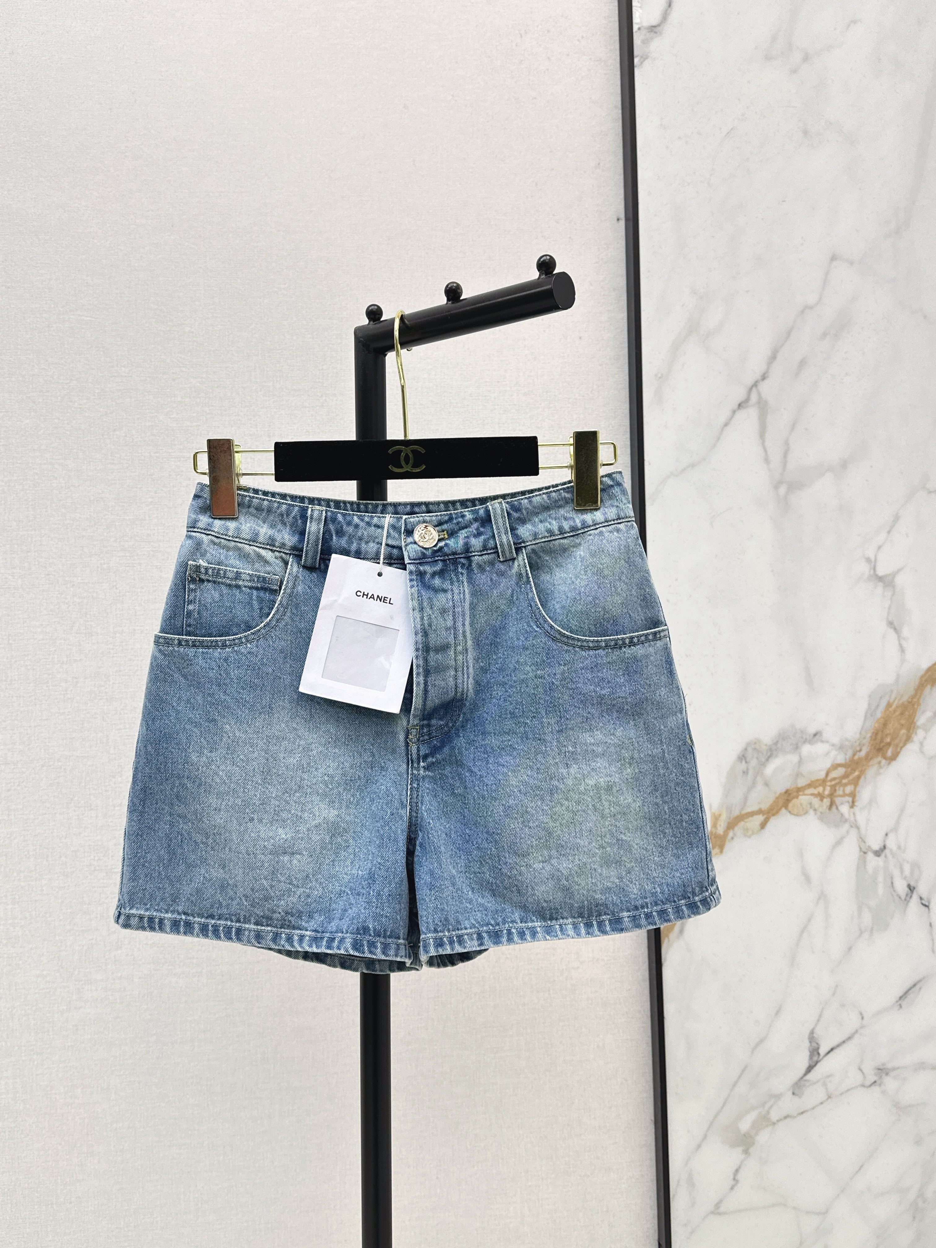 Denim shorts with back waist decoration