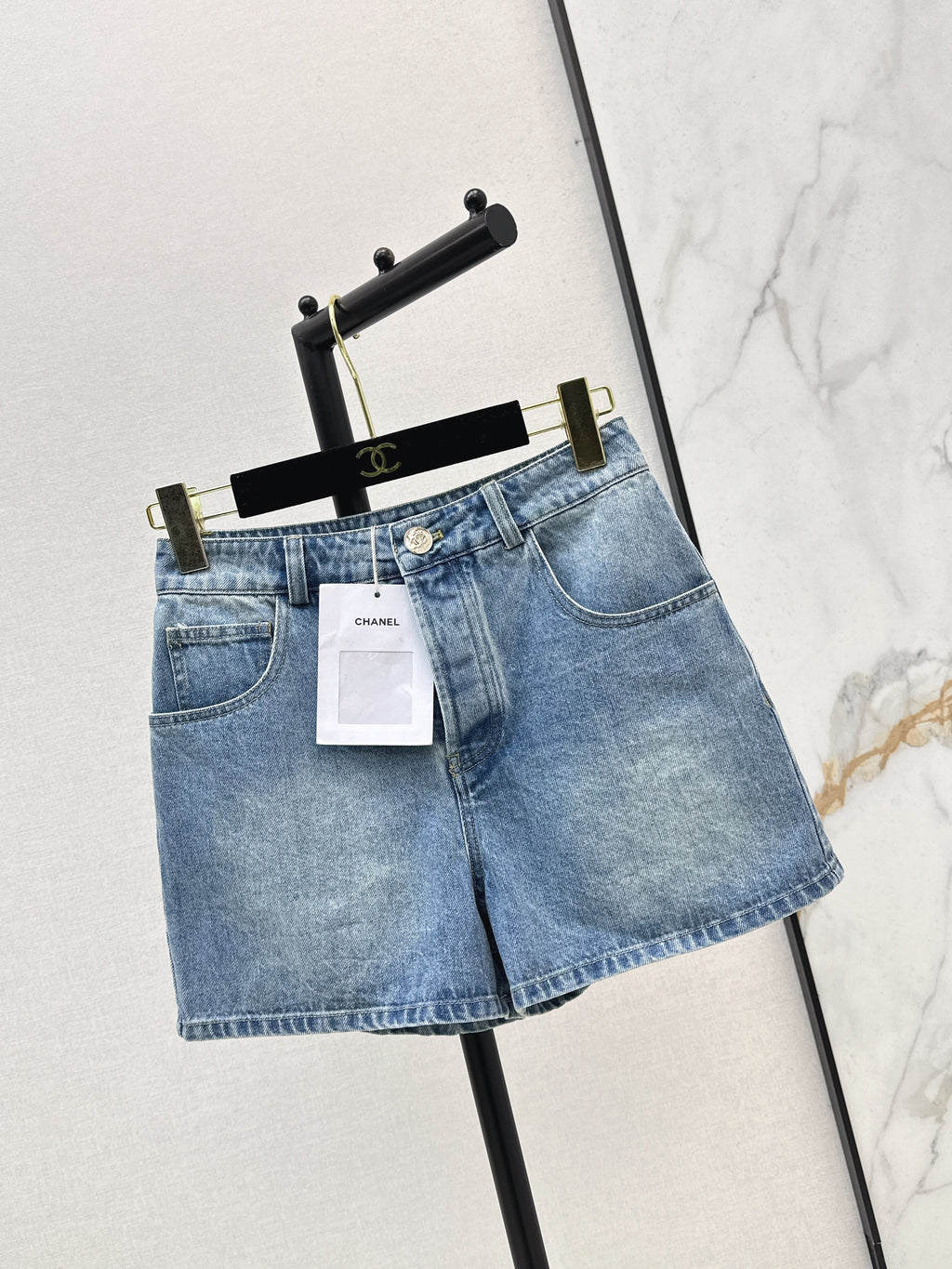 Denim shorts with back waist decoration
