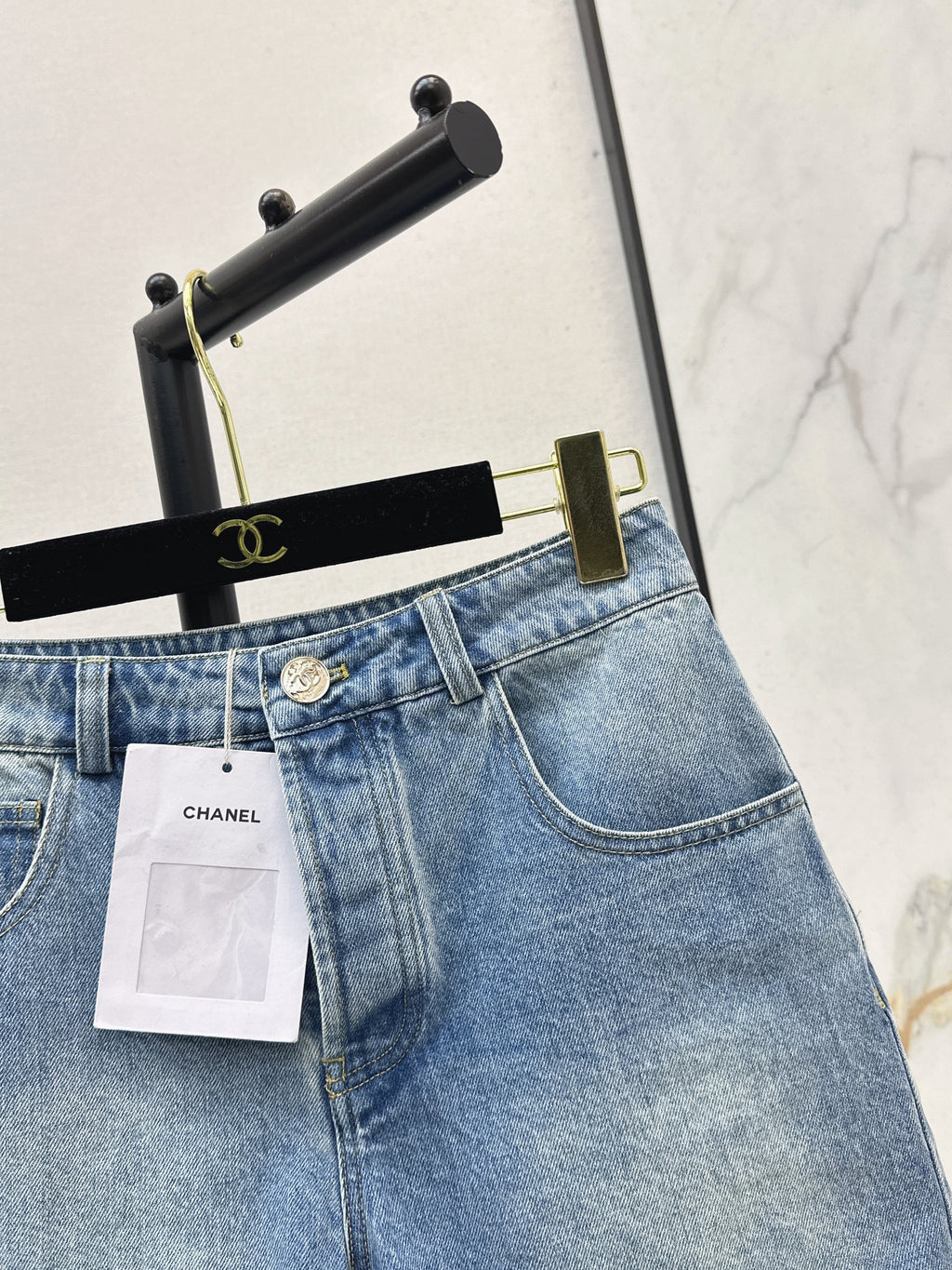Denim shorts with back waist decoration