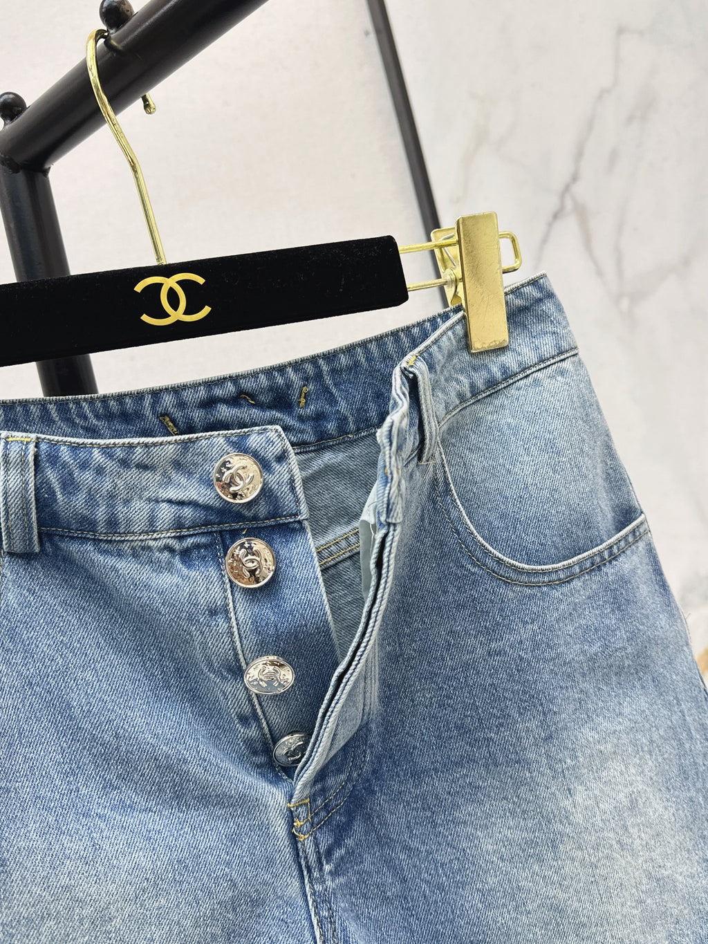 Denim shorts with back waist decoration