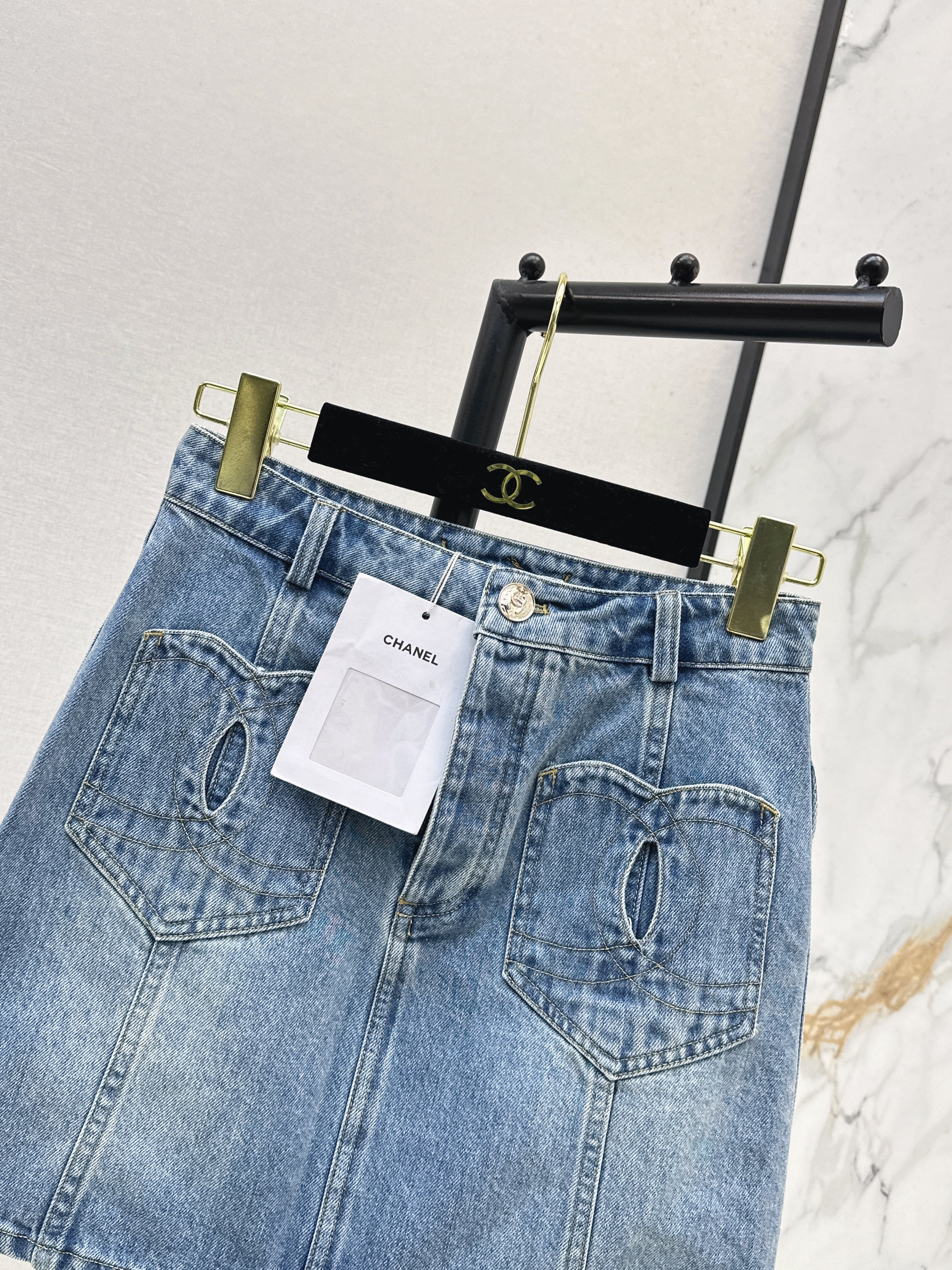 Denim skirts with back waist decoration