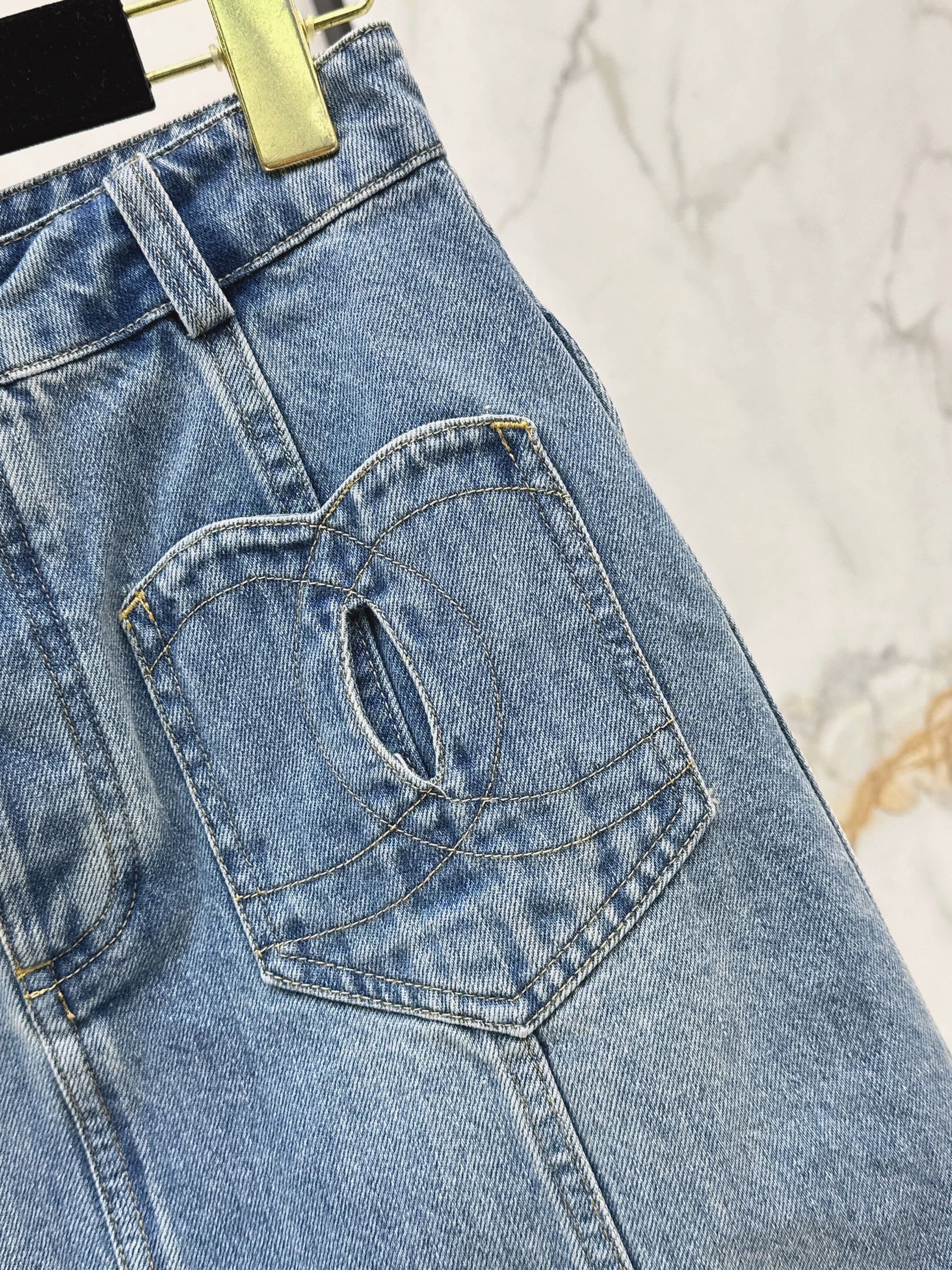 Denim skirts with back waist decoration
