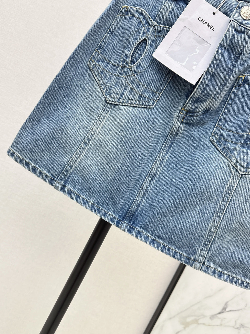 Denim skirts with back waist decoration