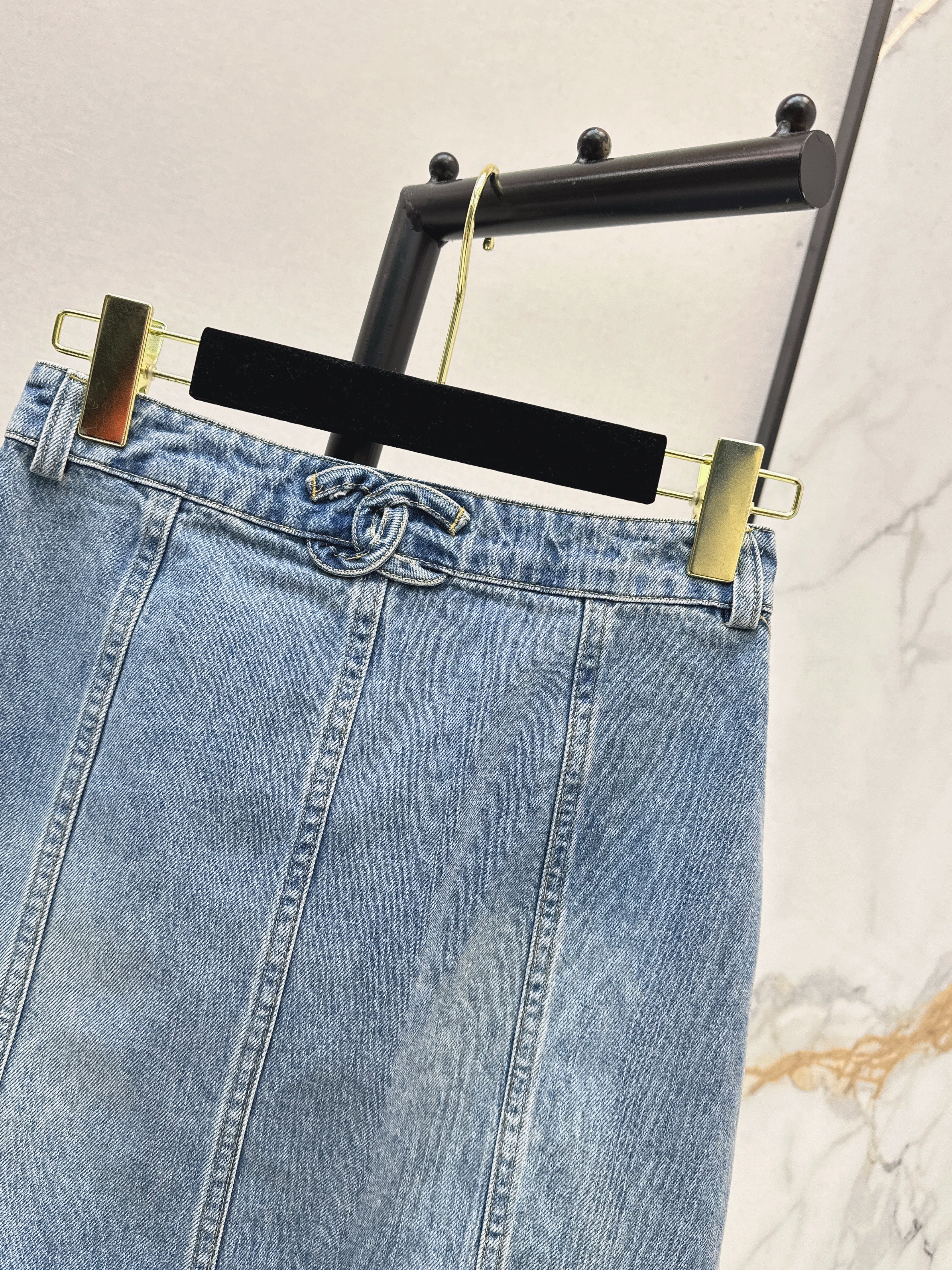 Denim skirts with back waist decoration