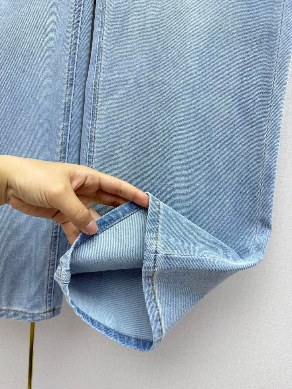 Straight-leg denim trousers