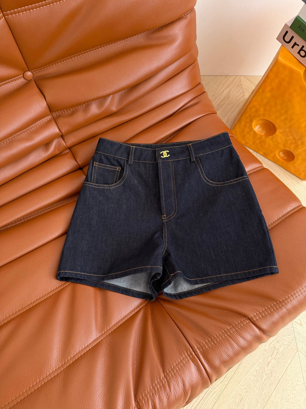 Jeans with a Twist-Lock Metal Buckle Design