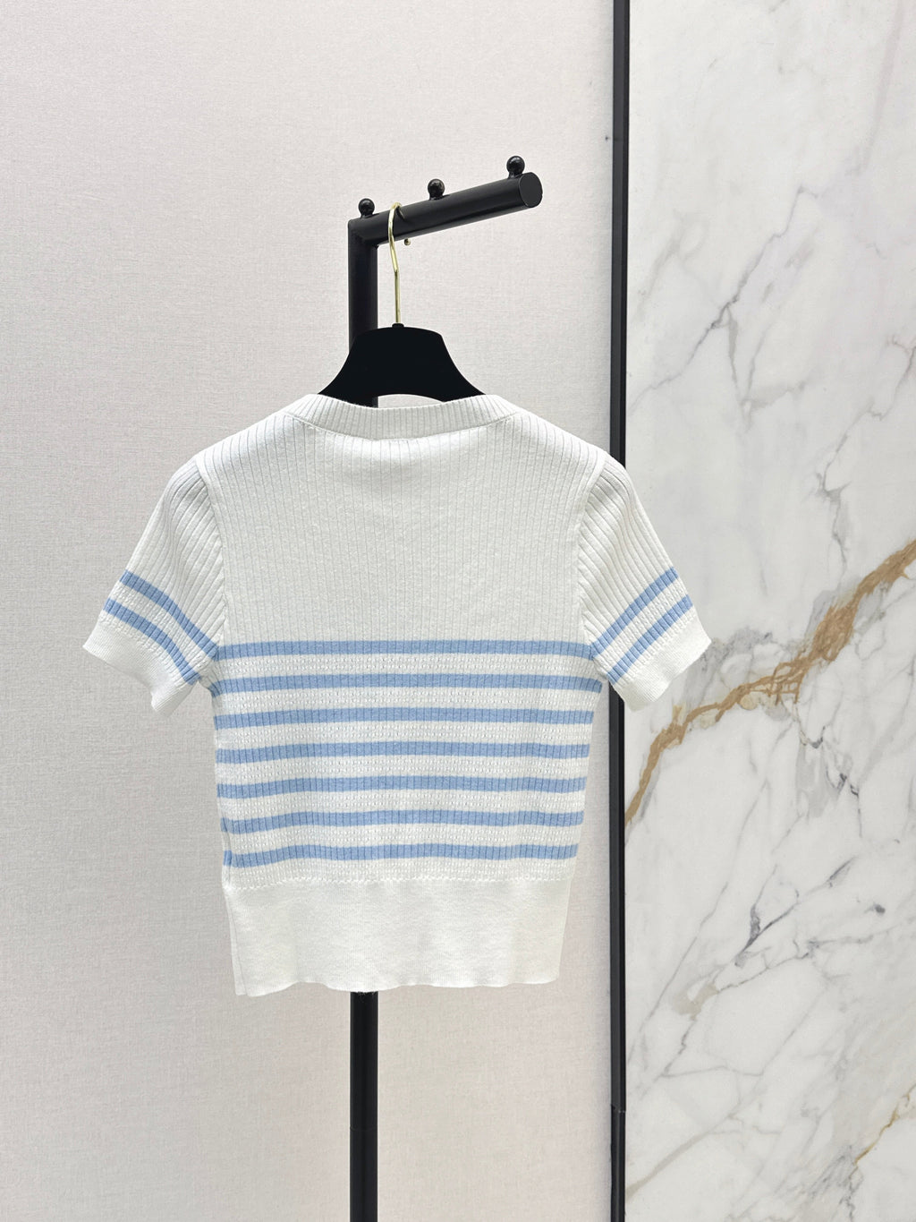 Striped knit top with bow embellishment