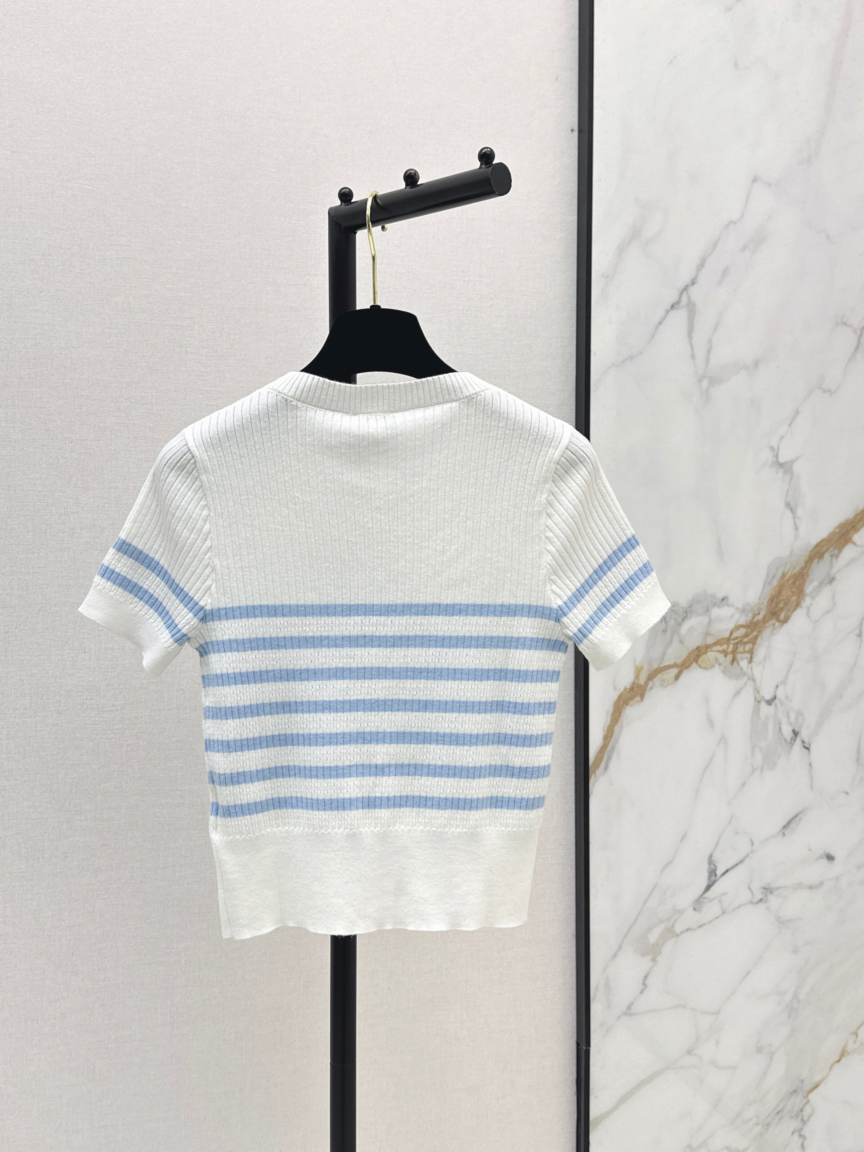Striped knit top with bow embellishment