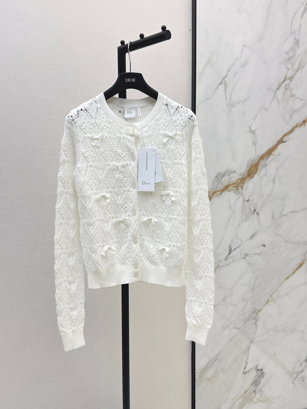 Bow-tie quilted jacquard openwork sweater