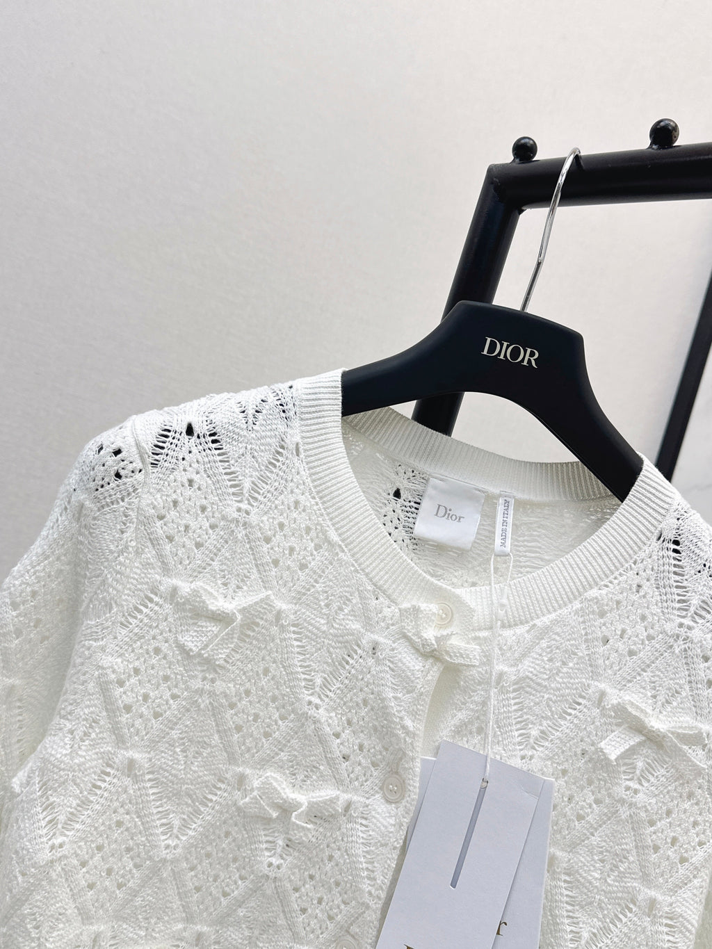 Bow-tie quilted jacquard openwork sweater