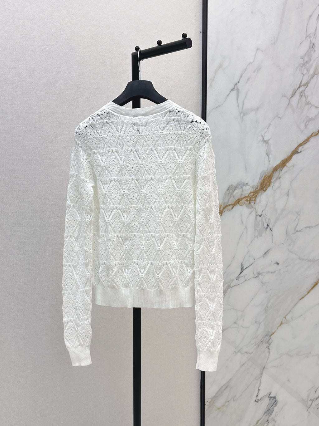 Bow-tie quilted jacquard openwork sweater