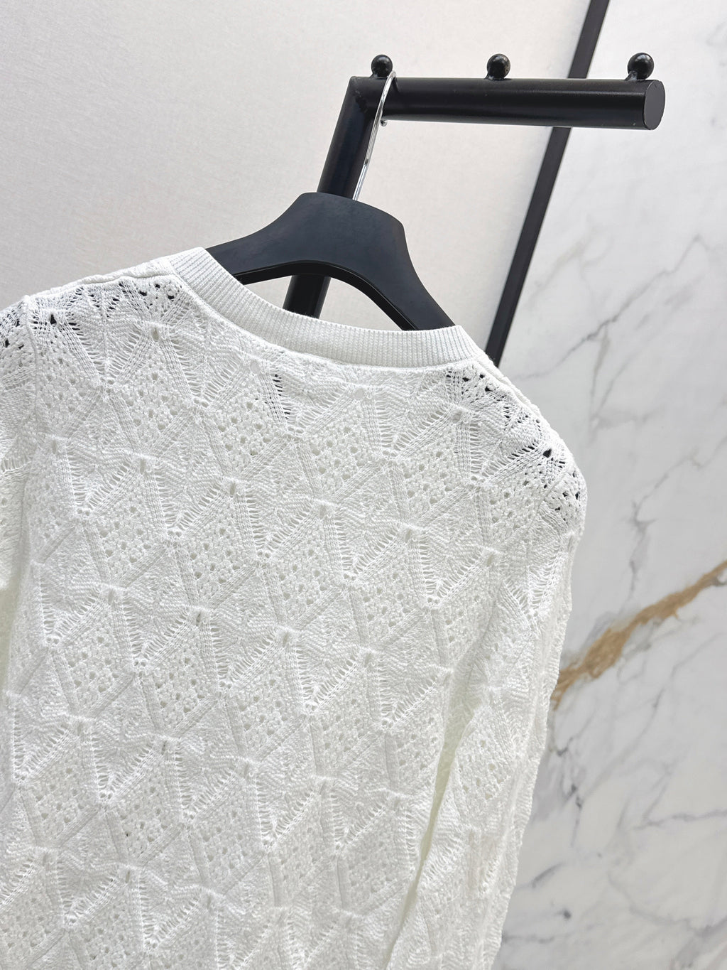Bow-tie quilted jacquard openwork sweater