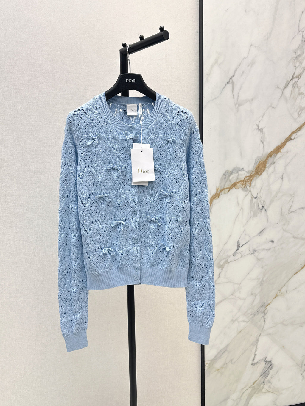Bow-tie quilted jacquard openwork sweater