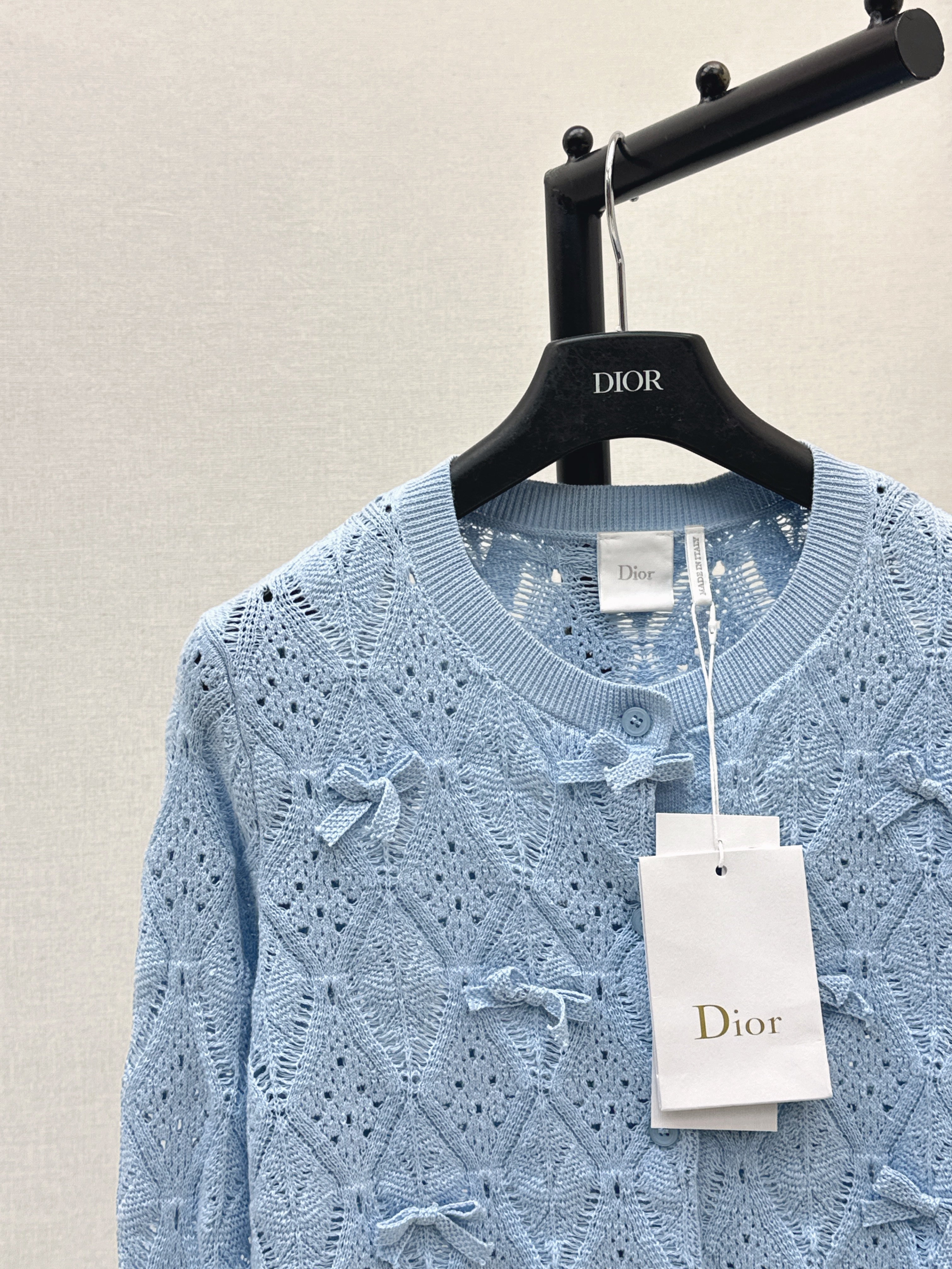 Bow-tie quilted jacquard openwork sweater