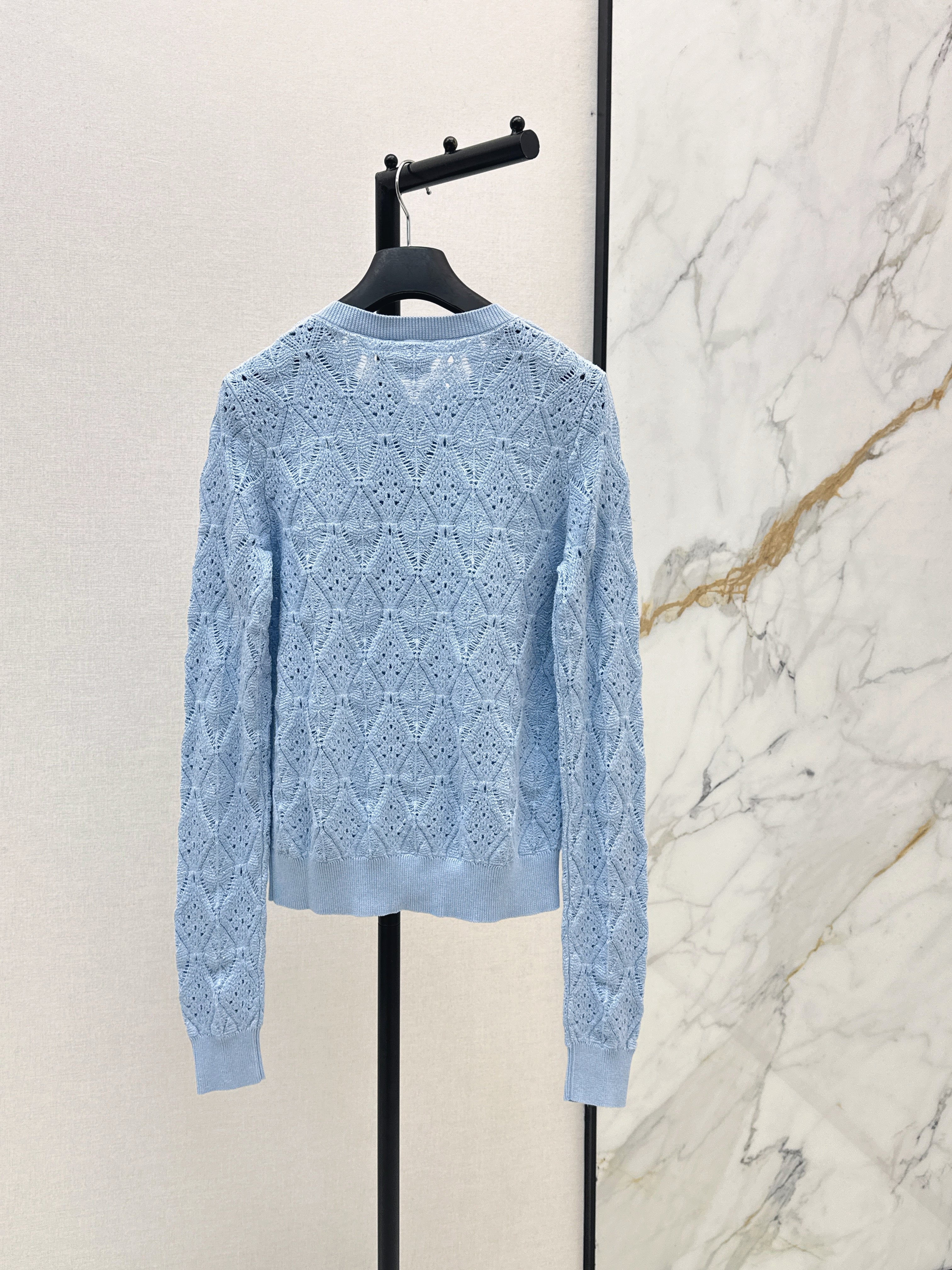 Bow-tie quilted jacquard openwork sweater