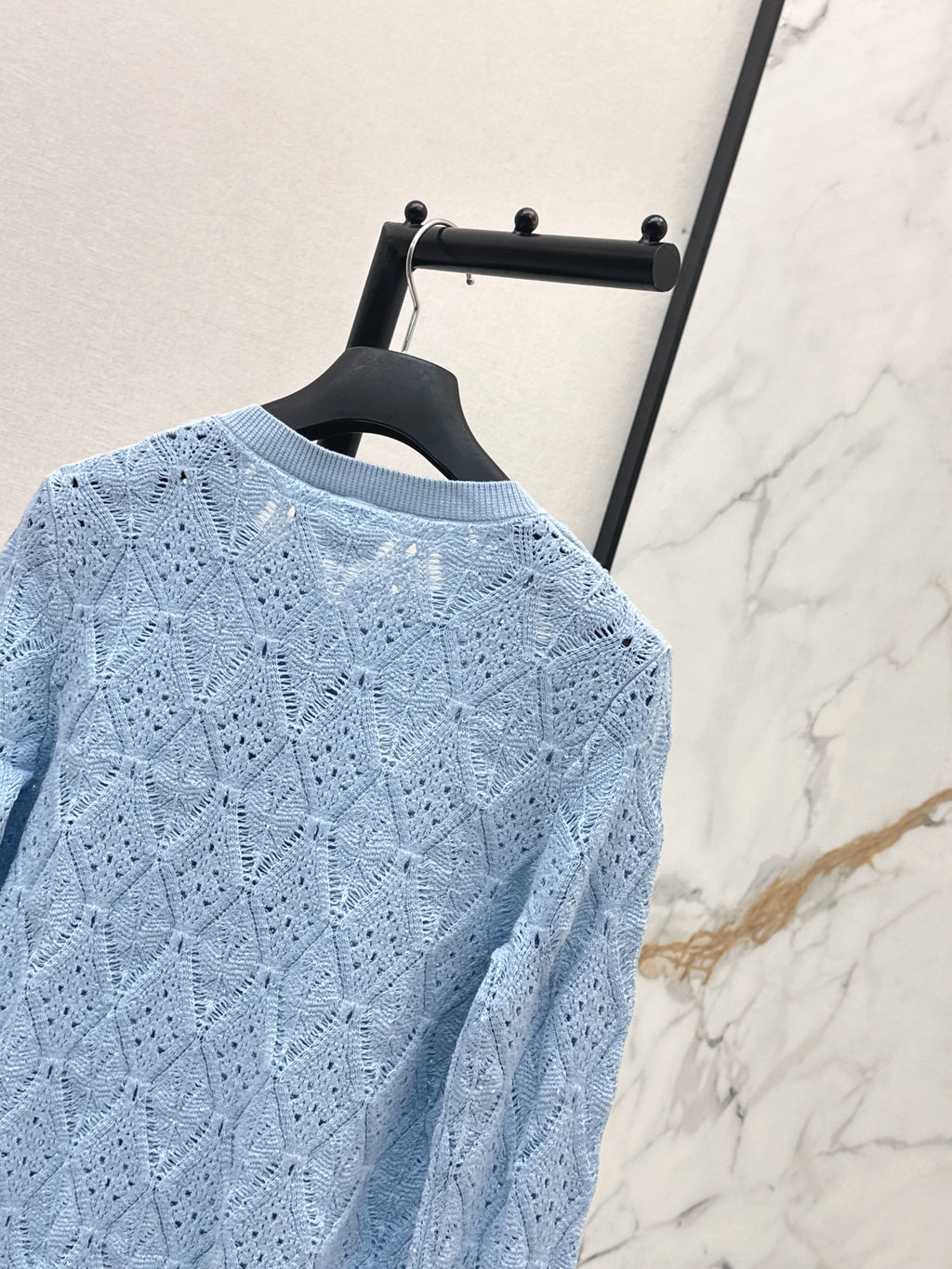 Bow-tie quilted jacquard openwork sweater