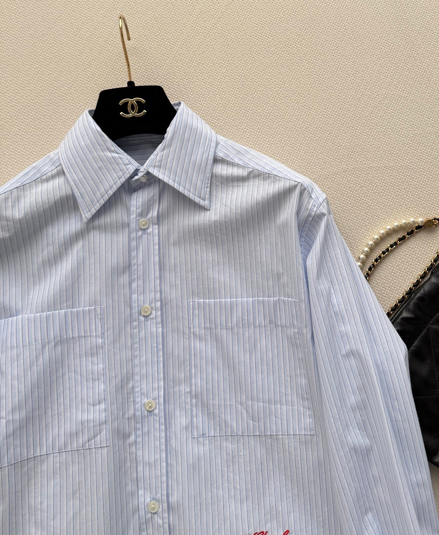 Short-sleeved blue striped shirt