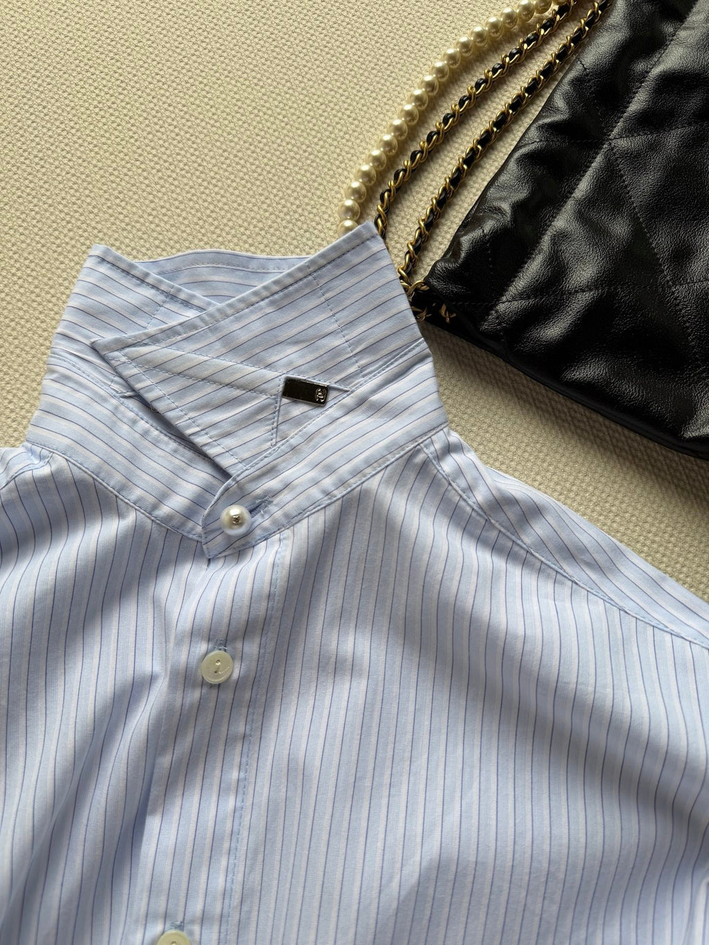 Short-sleeved blue striped shirt