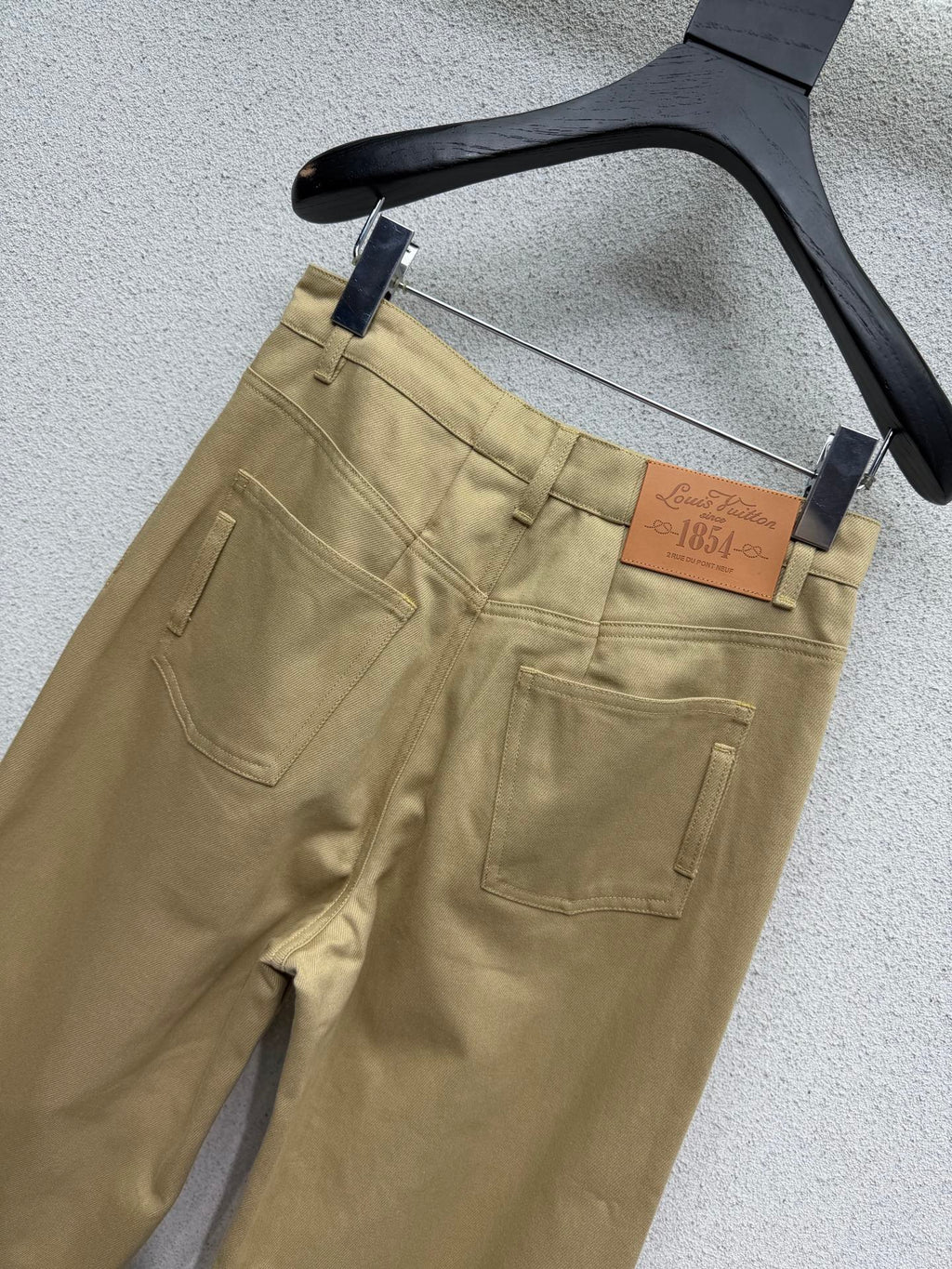 Khaki rolled-up denim jeans