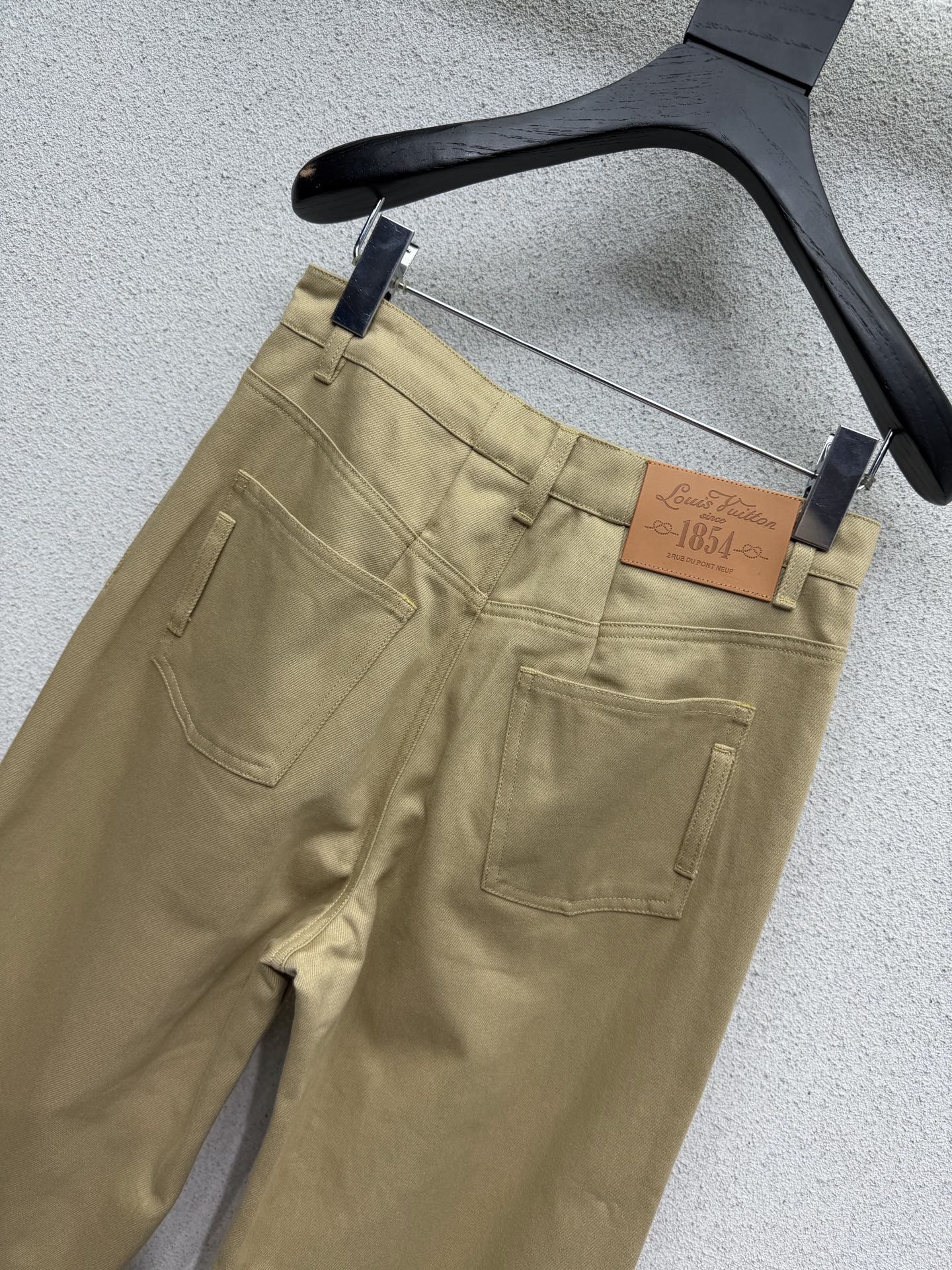 Khaki rolled-up denim jeans