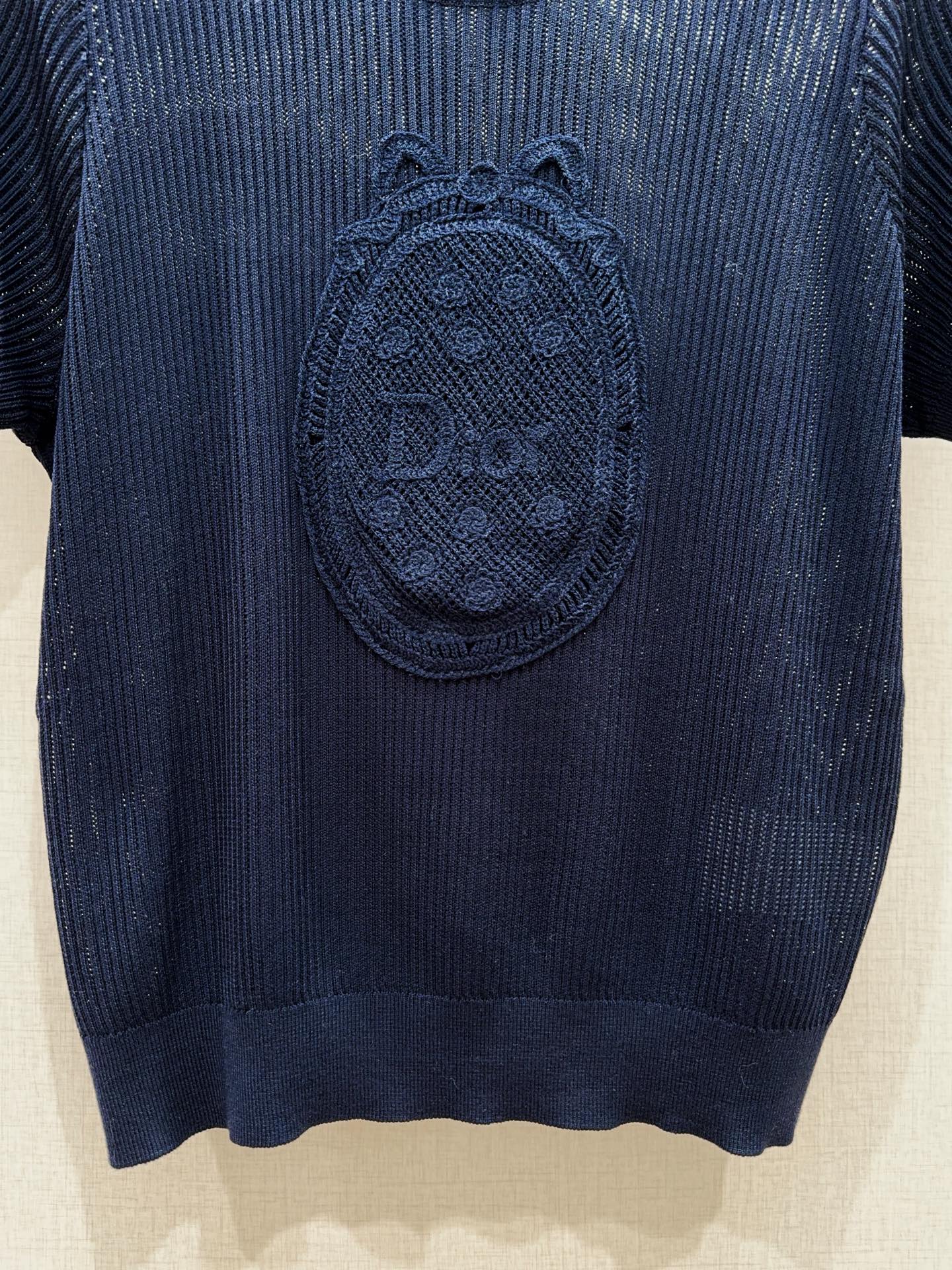 Hollow-out lace knit short-sleeved top