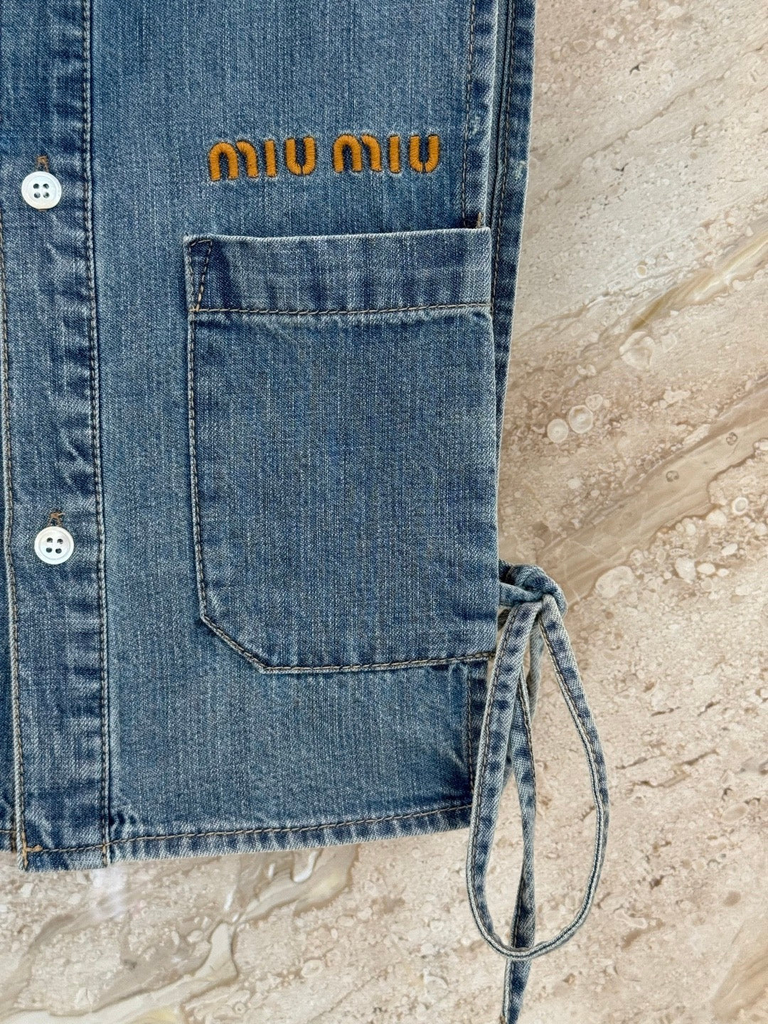 Denim drawstring vest