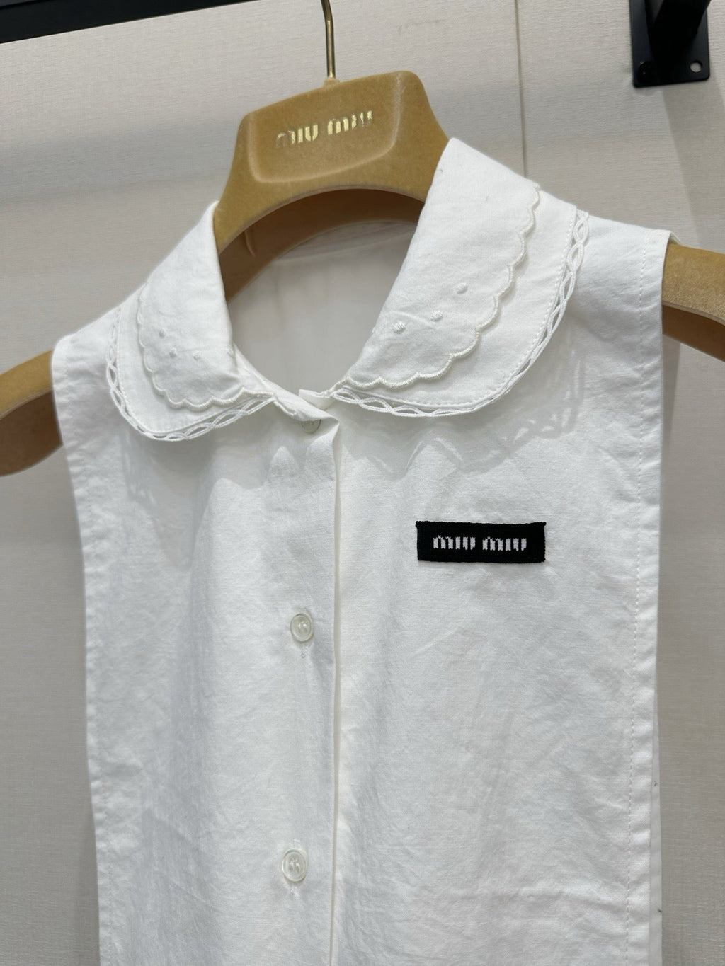 Embroidered sleeveless tie-front vest