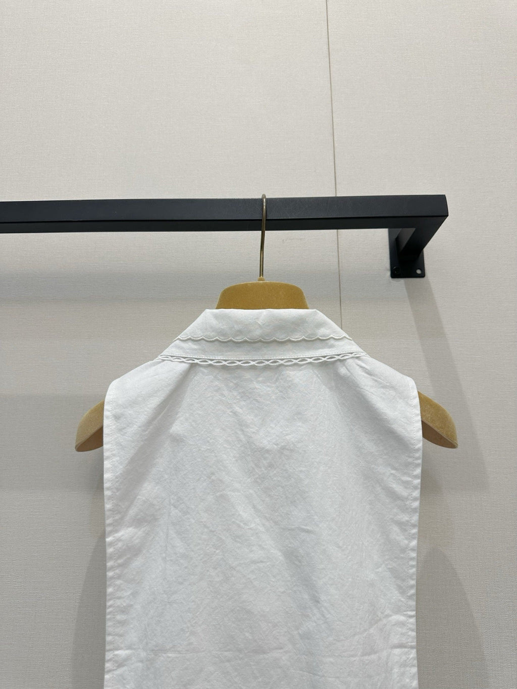 Embroidered sleeveless tie-front vest