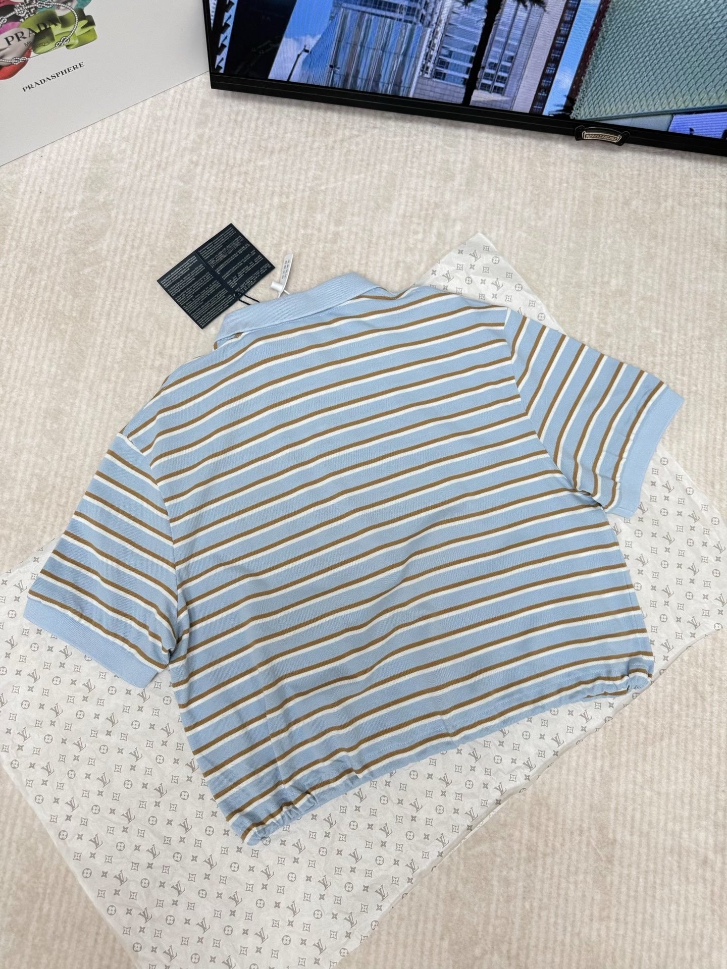 Striped short-sleeved polo shirt