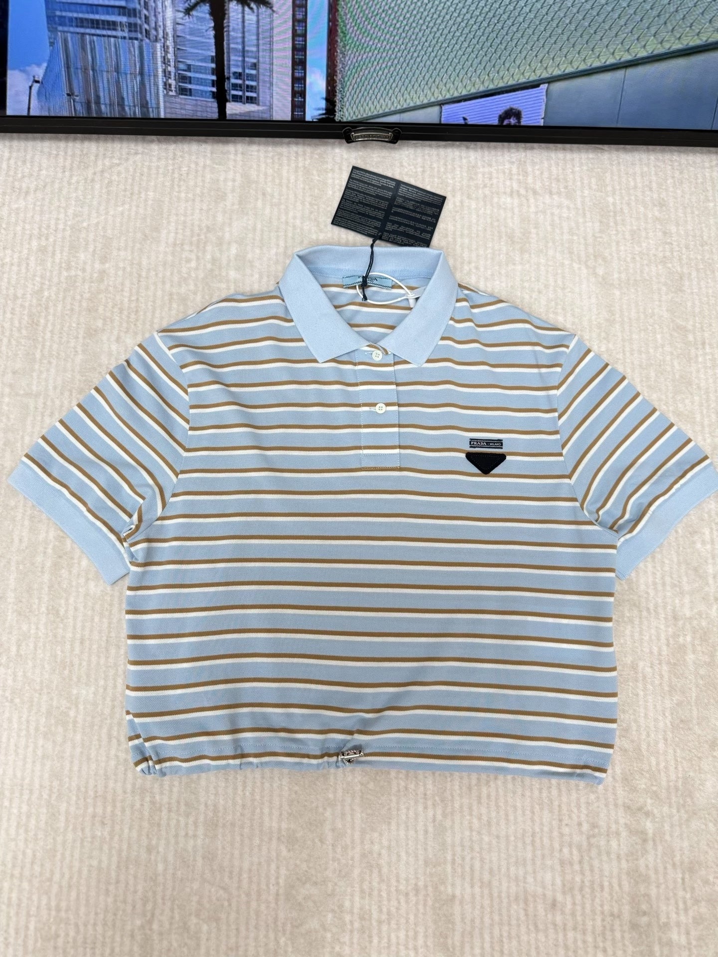 Striped short-sleeved polo shirt