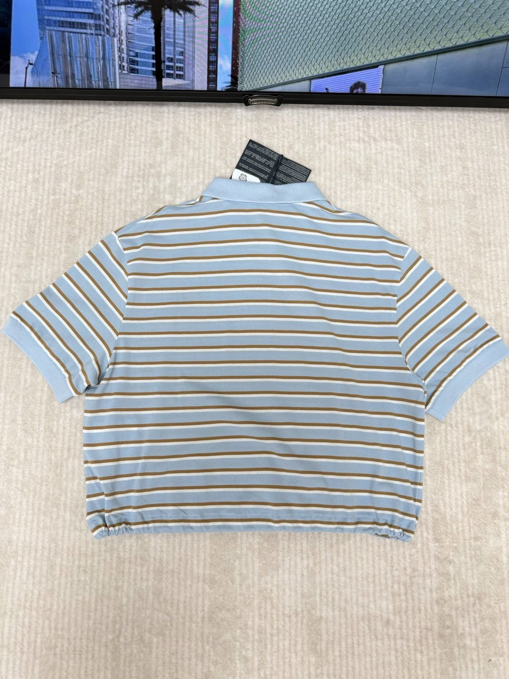 Striped short-sleeved polo shirt