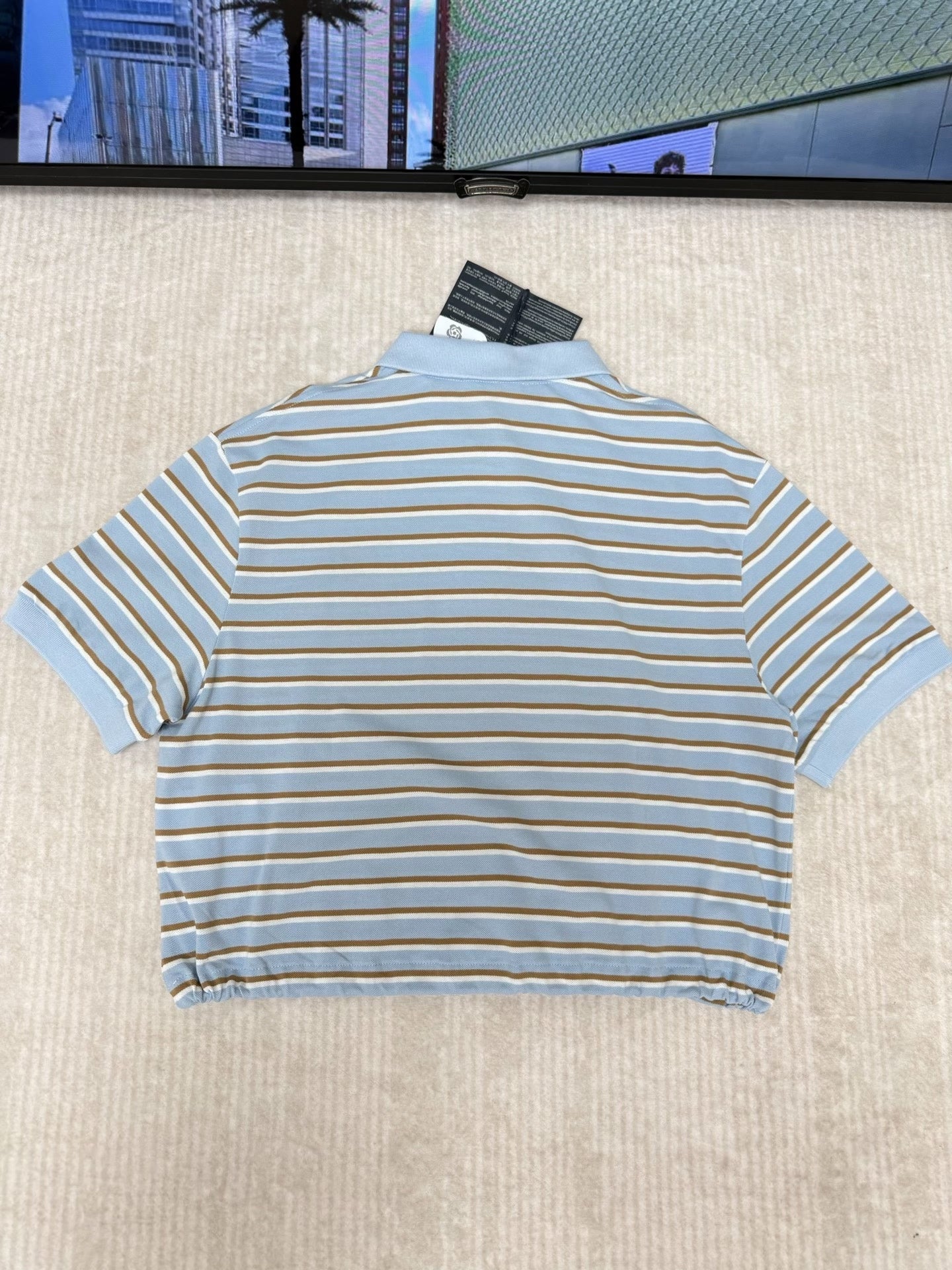Striped short-sleeved polo shirt