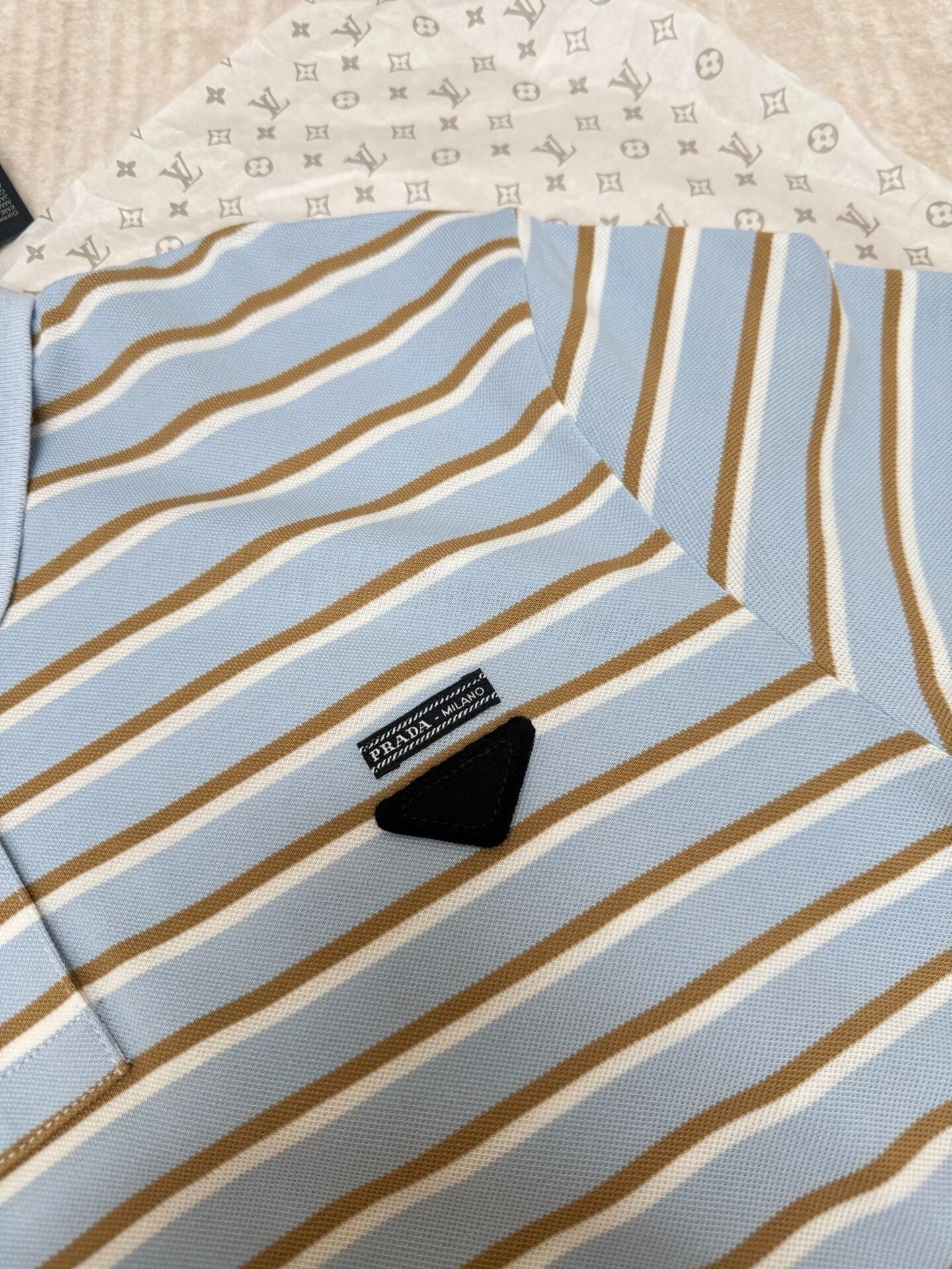 Striped short-sleeved polo shirt