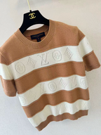 26 Striped short sleeved knitted sweater